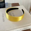 yellow wide-brimmed headband