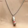 Pendentif couleur acier (sans chaîne)