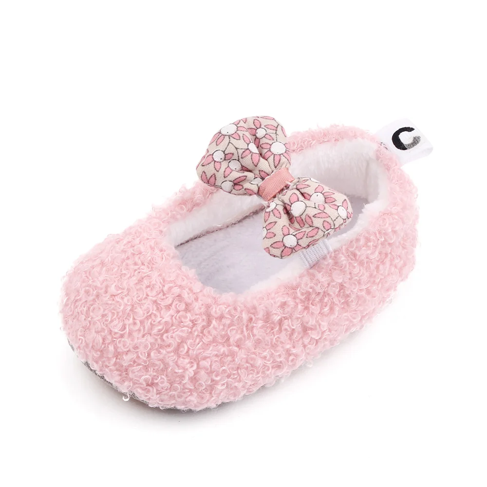 Autumn and Winter 0-1 Year Old Baby Solid Color Fluffy Cute Bow Warm Soft Soled Cotton Shoes factory