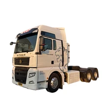 SITRAK Euro5 Emission Standard Diesel Manual Transmission Tractor 6x4 White Heavy Truck with Left Steering for Construction