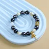 Pulsera de rueda de oración con mantra de seis sílabas - Perla negra