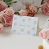 Merci (fleur bleue)