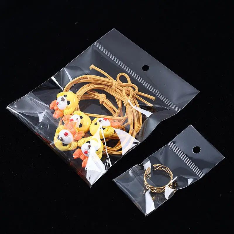 Customized Printed Mini Clear Header Plastic Bags  Packaging Plastic Opp Self-Adhesive Bags With Logo for Jewelry Clothing