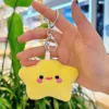 Boucle argentée étoile smiley jaune