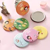 One small cartoon round mirror (pattern random).