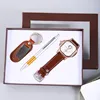 Set regalo con orologio color caffè, penna e portachiavi