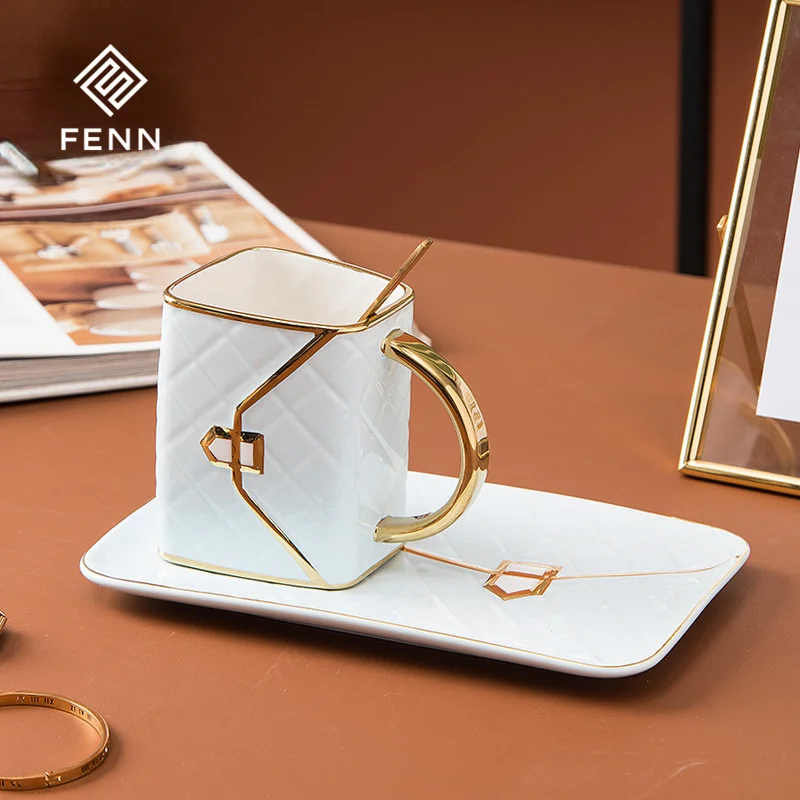 product fenn elegant novelty bag design glossy glaze thick handles ceramic cups and saucers set with embossed  gold painting process-62