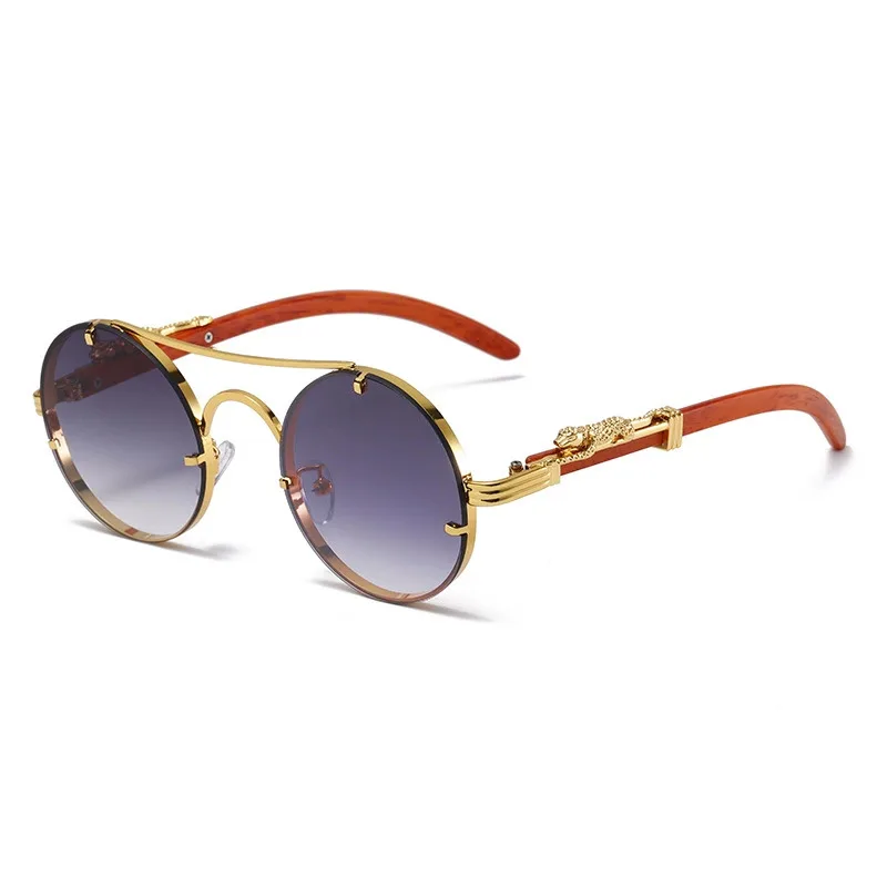 Heren zonnebril met rond metalen montuur en glazen met kleurverloop_voghion.com