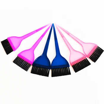 Hairdresser uses hair dye comb with tip tail highlight comb double-sided black hair tool hair dye brush