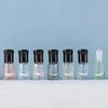 Perles de verre ordinaires + capuchon en plastique noir