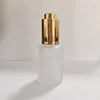 Frosted with gold dropper