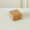 Brown [5 x 5 x 3 cm ring box with foam]