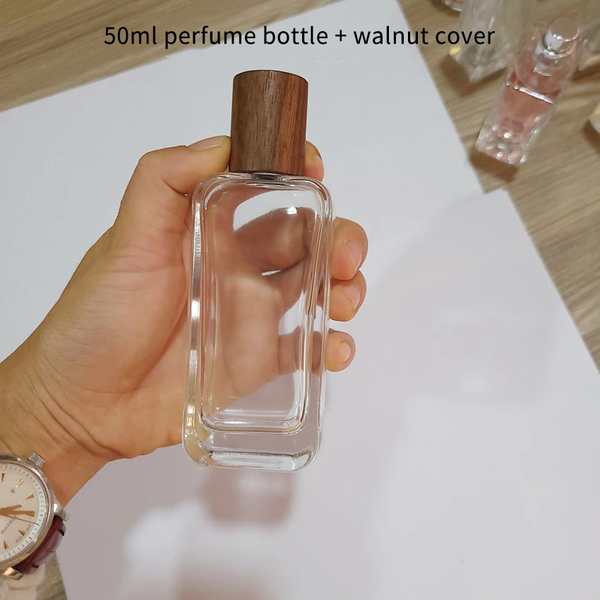 Source Flat Wholesale Wood Design Packaging Hot Sell Simple Empty 50ml  Perfume Spray Bottle on m.