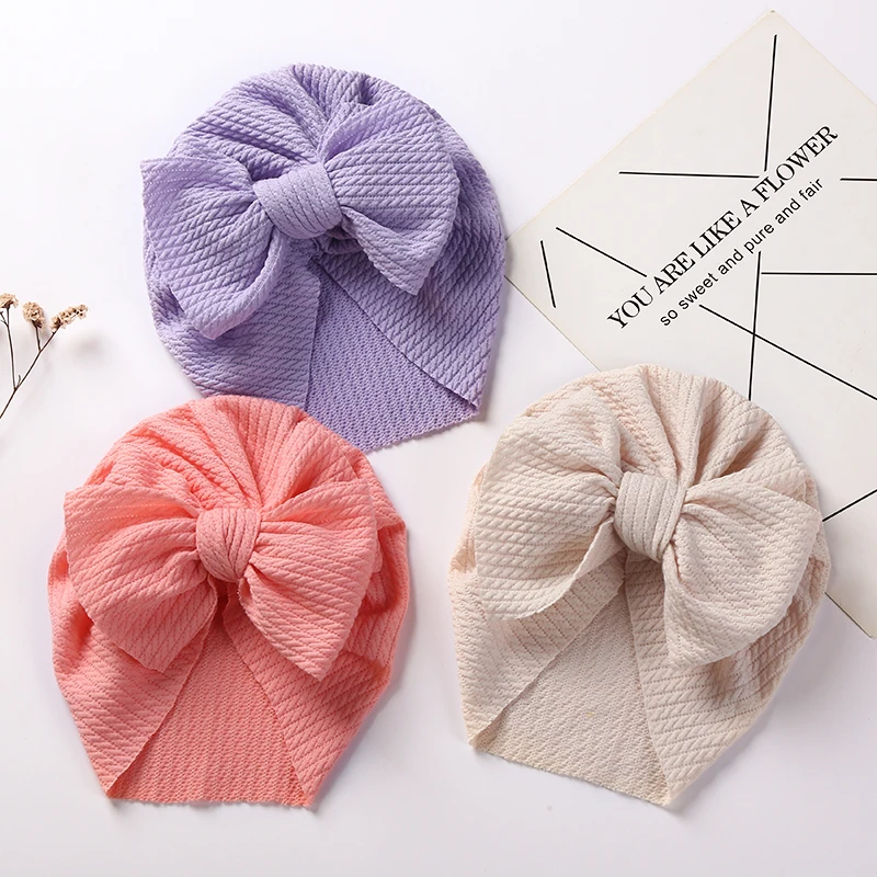 Милая шапка без козырька с бантом, однотонные головные уборы для новорожденных, шапки с узлом, мягкая шапка-тюрбан с милым бантом карамельных цветов, детская шапка для мальчиков и девочек