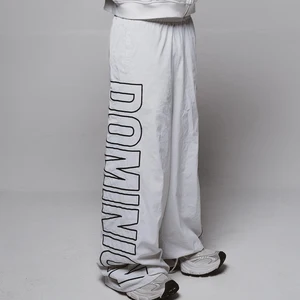 Factory High Quality Custom Loodse Fit Streetwear Pants Men logo Embroidery Oversized Wide Leg Baggy Nylon Track Pants