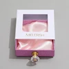 White with pink drawer