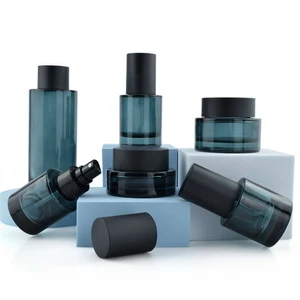 Luxury Blue Glass Bottle Jar Sets for Skin Care Cosmetics New Design 50g 40ml 100ml 120ml Flat for Eye Drops Customizable OEM
