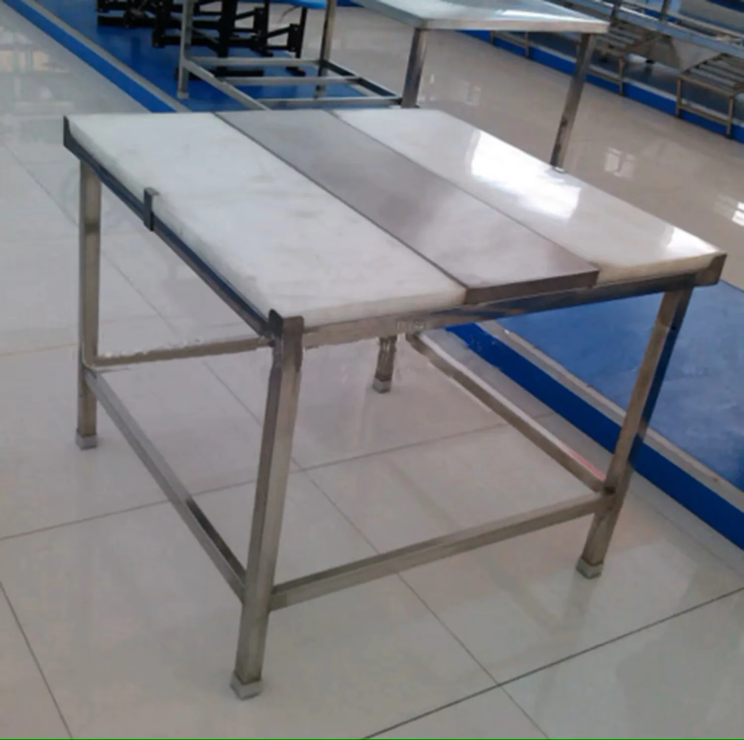 Durable stainless steel worktops for meat processing plants and industrial production lines