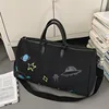 Bolso graffiti negro