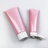 Pink tube with white cap