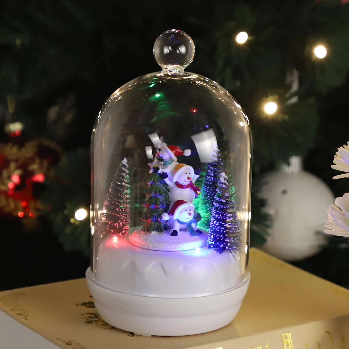 Custom Made Christmas Fairy Light Battery lit Christmas Clear Glass Musical Dome with rotating festive winter characters inside supplier