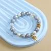 Pulsera de rueda de oración con mantra de seis sílabas - gris ahumado