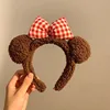 Cerchietto per capelli con fiocco marrone e orsetto