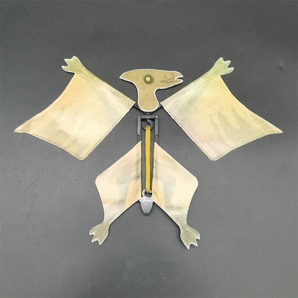 Wind up magic rubber band paper flying dinosaur toy