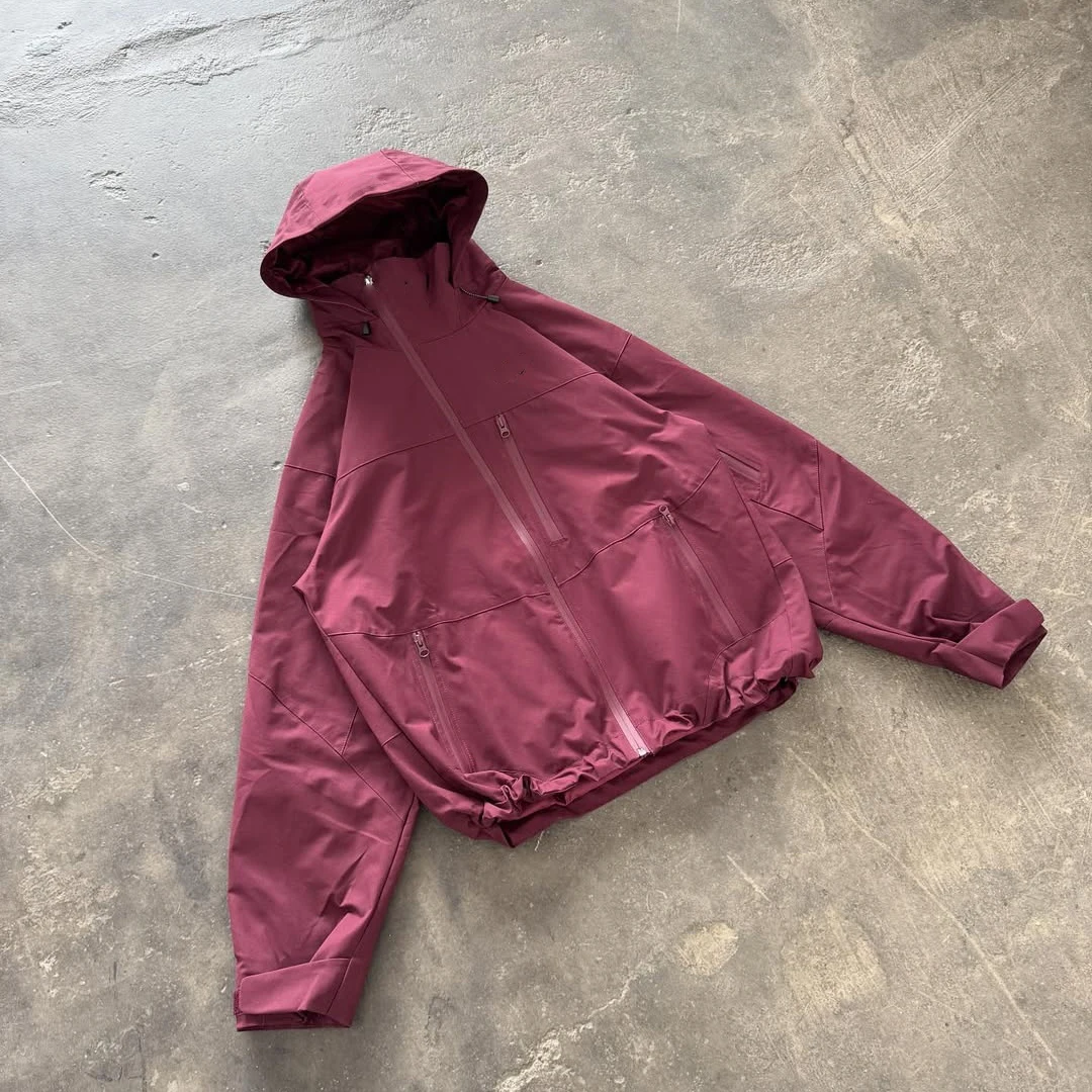 XINSHENG Custom Mens Waterproof Sportswear Outdoor Zip up Nylon Windbreaker Track Jacket with Hood for Men manufacture