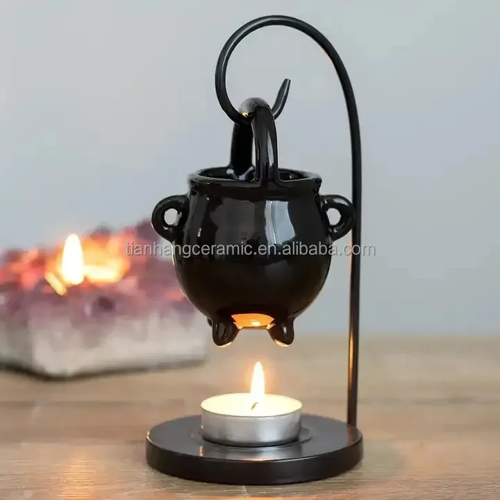 Wholesale Hanging Black Cauldron Shape Ceramic Oil Burner Ceramic Wax Melt Burner With Iron Shelf Aroma Wax Burner.jpg