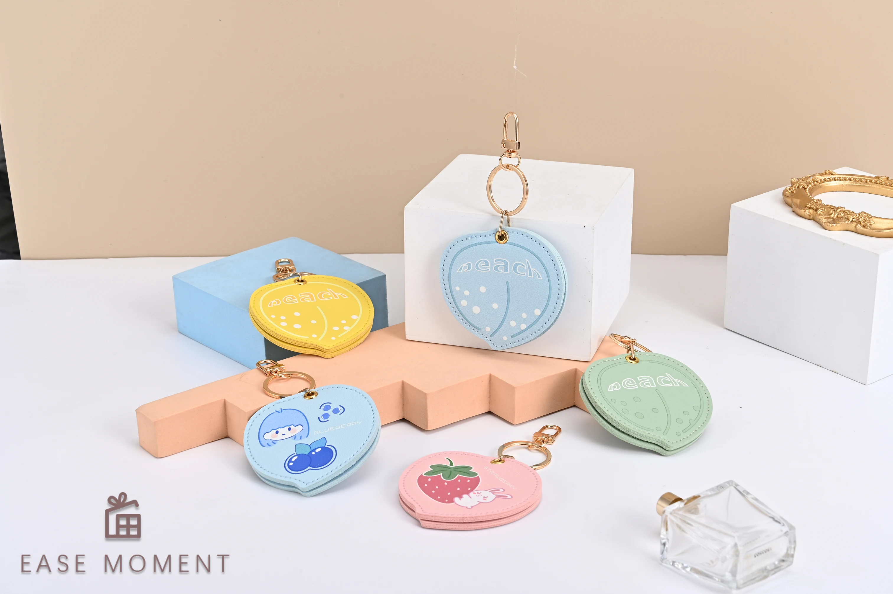 Newly Launched Gold Keychain Multi-color Leather case with Peach Shaped Cute Birthday Gift Hanging Bag and Makeup Mirror (1PC)