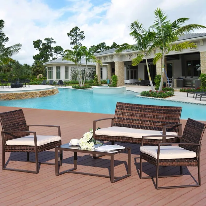 Садовая мебель из ротанга для современного внутреннего двора: стол стулья и диван