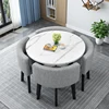White round table + gray fabric chairs