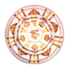 Juego de platos de cuatro piezas.