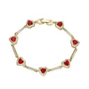 Bracciale con diamanti rossi dorati