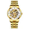 White dial, gold case, gold strap