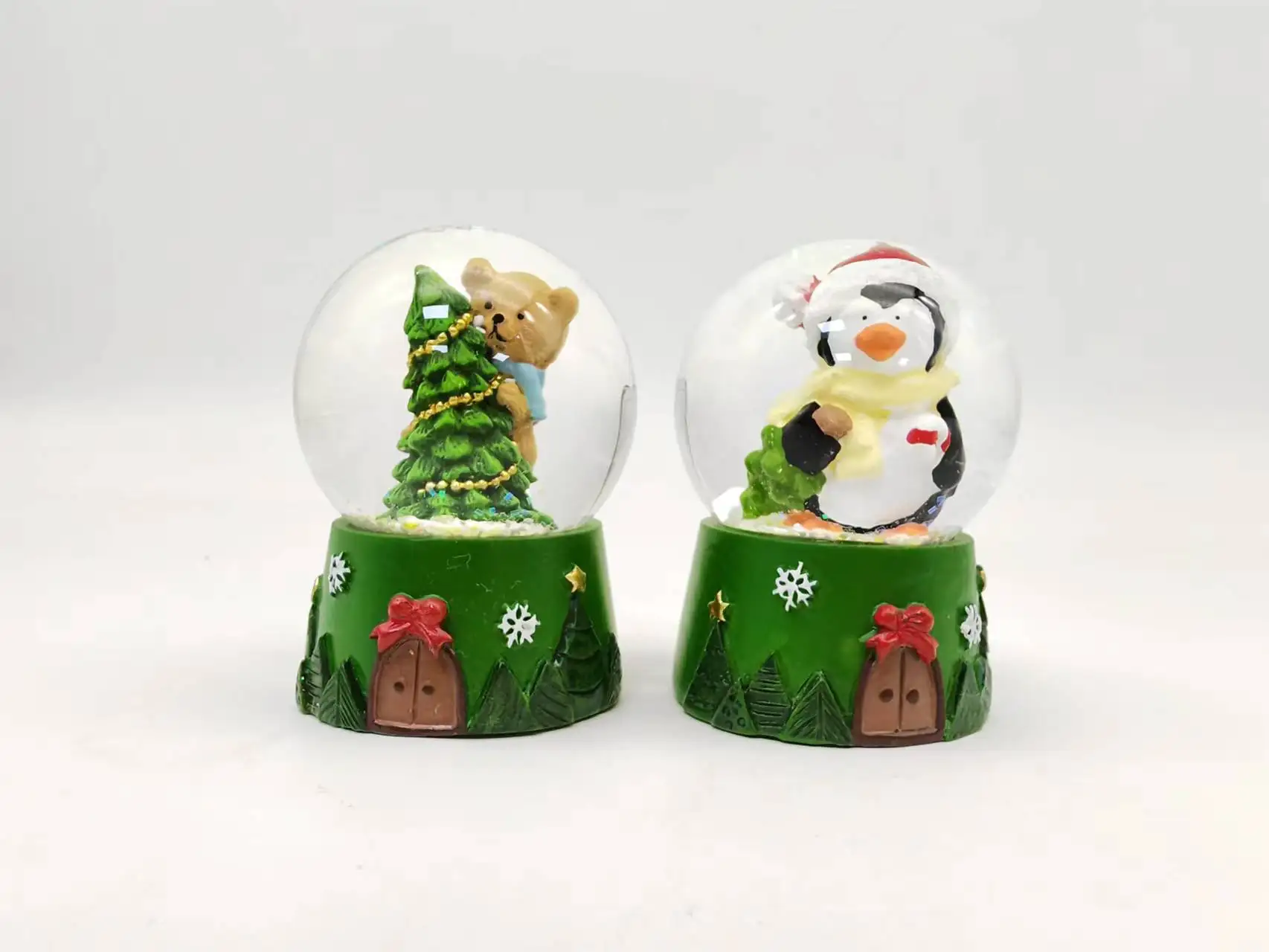 Factory Direct Sell Green Base Water Globe Christmas Water Transparent Glass Ball With Resin Xmas Figurine Inside Creative Gift manufacture