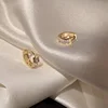 Small circular ear buckle (golden yellow)