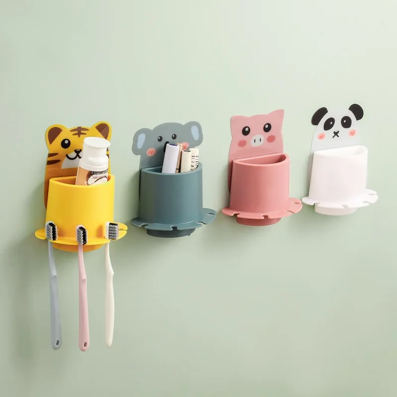 Cartoon Bathroom stick-on toothbrush holder Suction wall non-punch toothbrush holder Bathroom household storage rack supplier