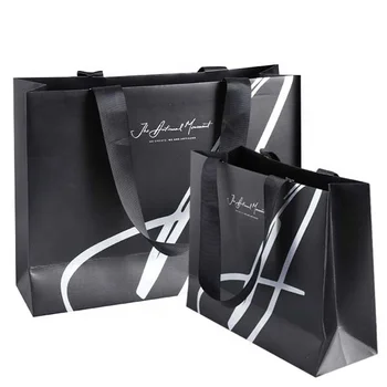 Custom logo gift bag glossy clothes branded retail shopping paper bags with rope handles