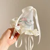 Chapeau en dentelle brodée