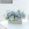 White wooden fence with rose and blue combination