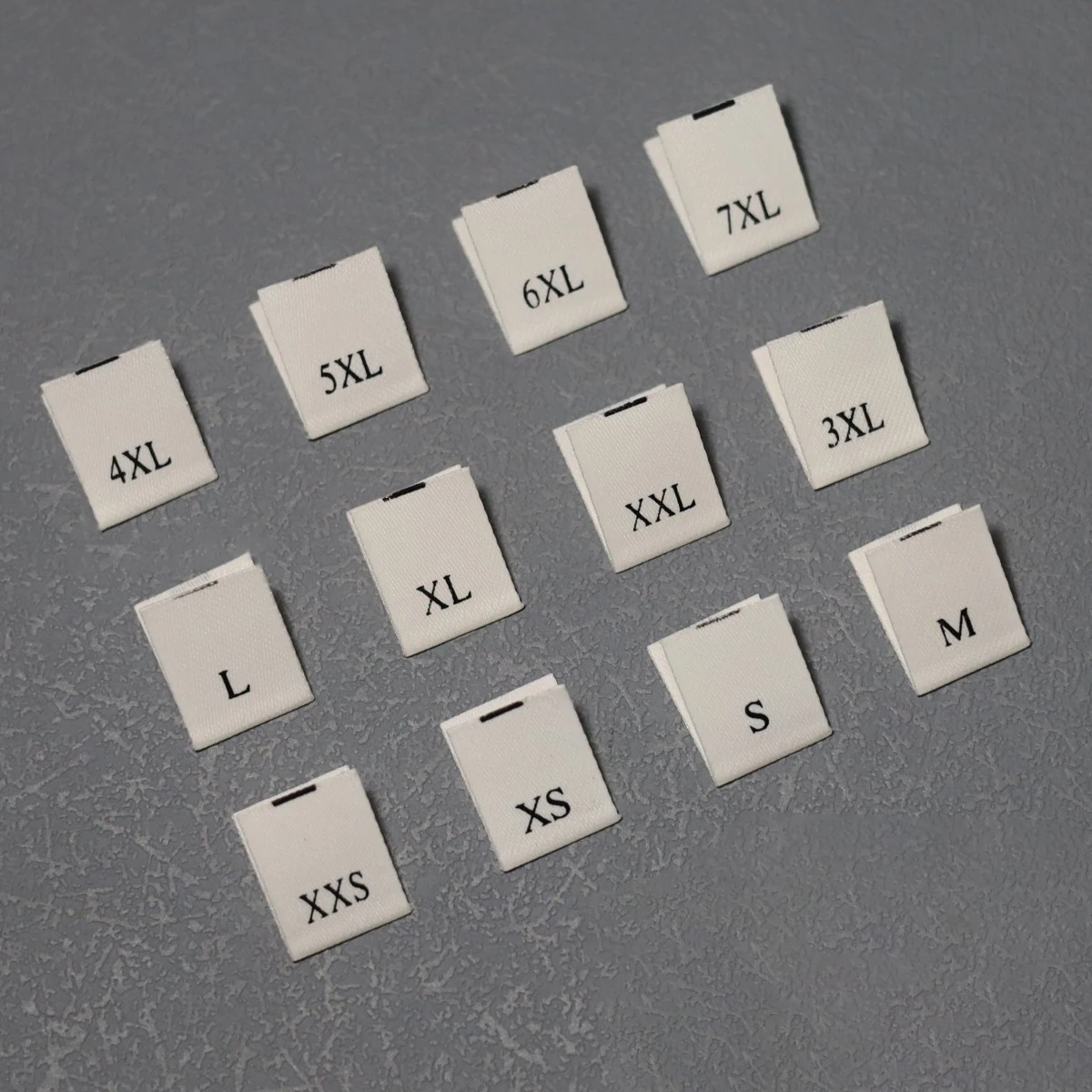Vente en gros d'étiquettes de taille de vêtement blanches XXS XS