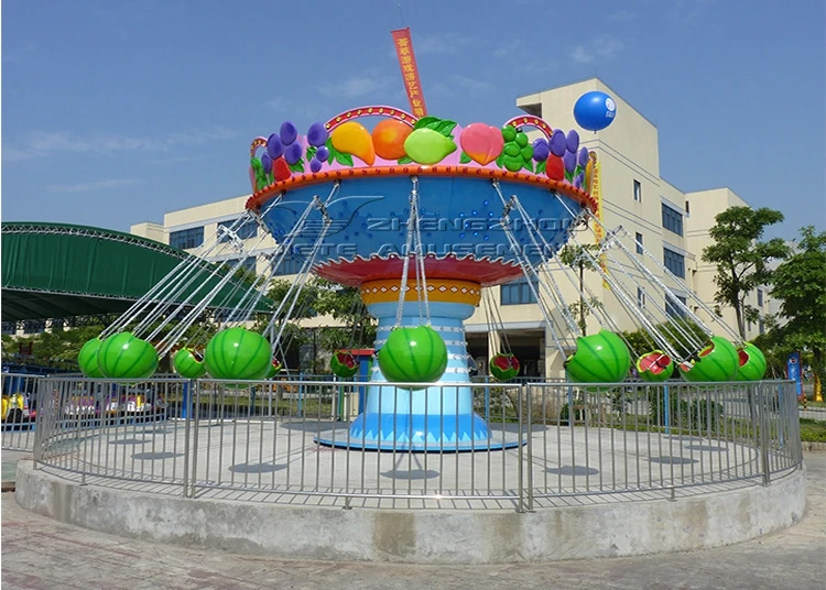 Funfair rides carnival games children amusement park fruit wave swing ride watermelon flying chair