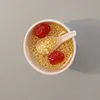 Agua de azúcar de mijo y azufaifo rojo.