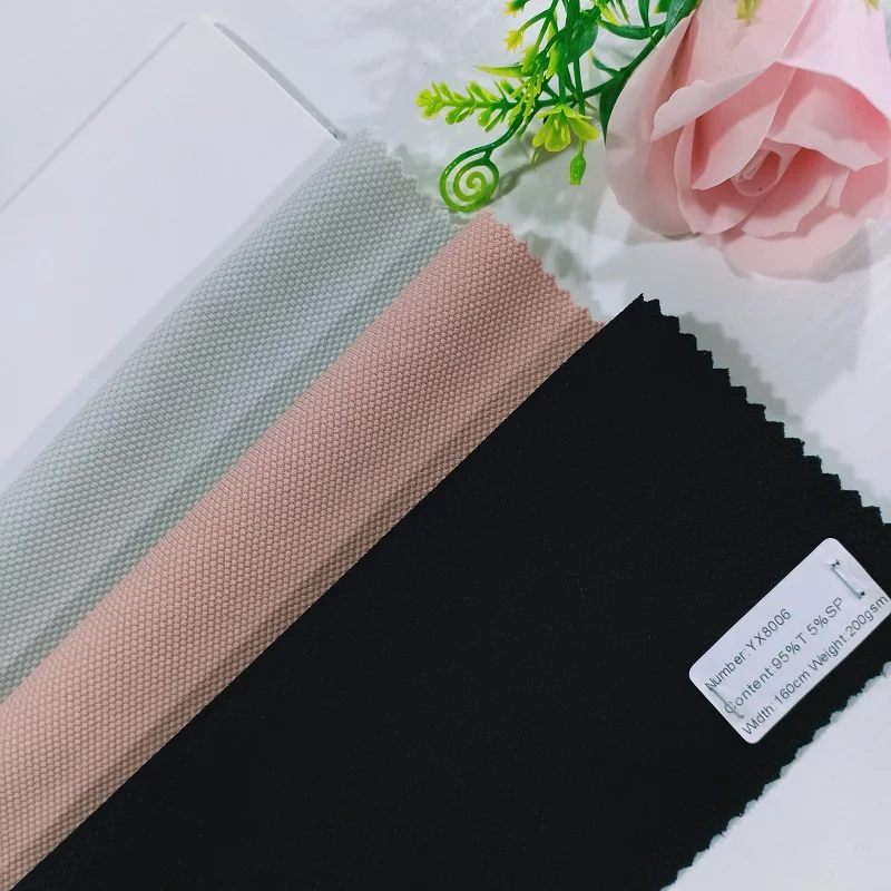 
 Дешевые трикотажные ткани из смеси спандекса и полиэстера жаккарда кукурузы для платья или домашнего текстиля  