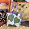 Purple with a green background and hearts - buckle bag