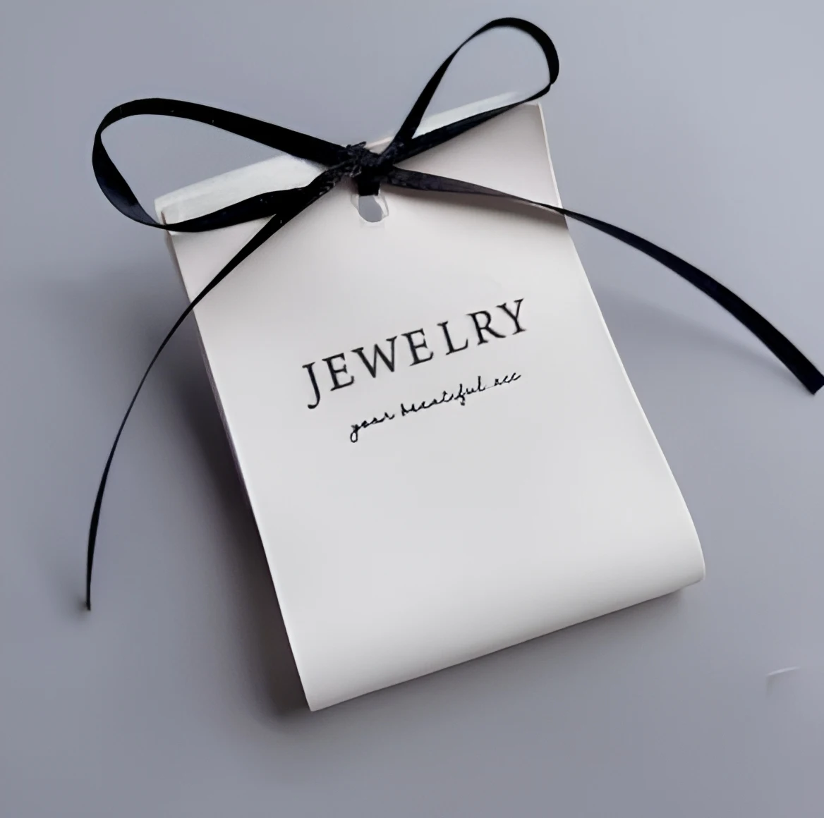 Artisan-crafted backing cards for jewelry presentation Production quality standards for earring display cards