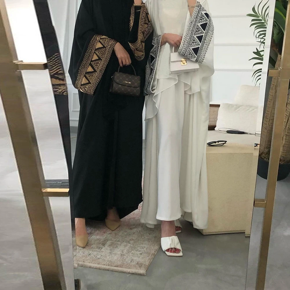 Alibaba.com: ZY ZQ-107 Embroidery Palestinian Keffiyeh Crepe Maxi Dress,  breathable and lightweight, ideal for Eid, weddings, and casual occasions.  In-stock items available for quick delivery.