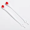 12 white buttons with red clasps